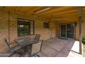 Covered patio with outdoor seating and a view of the backyard at 2913 E Earll Dr, Phoenix, AZ 85016