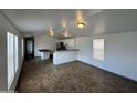 Open-concept living area features tile flooring and a seamless transition to the kitchen at 625 W Mckellips Rd # 236, Mesa, AZ 85201