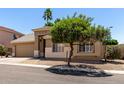 Attractive single-Gathering home with a xeriscaped front yard, offering easy maintenance and appealing curb appeal at 6631 E Rhodes St, Mesa, AZ 85215