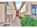 Charming entryway with brick accents and an ornate front door at 747 E Meadow Ln, Phoenix, AZ 85022