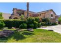 Scenic view of a well-maintained home with mature landscaping, lush greenery, and a private setting at 3203 E Ellis St, Mesa, AZ 85213