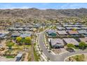 Well-maintained neighborhood with mountain views, lush landscaping, and community amenities at 3366 E Constance Way, Phoenix, AZ 85042
