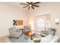 Bright living room featuring high ceilings, large windows, and contemporary furnishings at 3522 E Cherokee St, Phoenix, AZ 85044