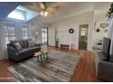 Inviting living room with vaulted ceilings, natural light, and modern furnishings at 11596 W Sierra Dawn Blvd # 33, Surprise, AZ 85378
