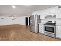 Open-concept kitchen featuring modern appliances and seamless flow to the living space at 14215 N 36Th Way, Phoenix, AZ 85032