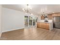 Modern kitchen featuring new stainless steel appliances, countertops and stylish lighting at 7647 E Montecito Ave, Scottsdale, AZ 85251