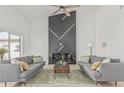 Inviting living room with a modern fireplace and comfortable seating at 862 W Rawhide Ave, Gilbert, AZ 85233