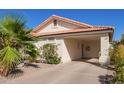 The exterior showcases a covered carport, desert landscaping, and the house number, 1803, by the front door at 1803 E Palm Beach Dr, Chandler, AZ 85249