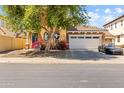 Beautiful two-story home with a well-maintained yard, two car garage, and a welcoming entrance at 9132 S Parkside Dr, Tempe, AZ 85284