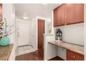 Charming entryway with a built-in desk and storage cabinets at 9820 N Central Ave # 307, Phoenix, AZ 85020