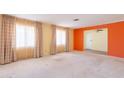 Spacious living room featuring neutral walls, carpeted floor, and large windows with coverings at 1156 E Brenda Dr, Casa Grande, AZ 85122