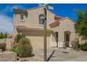 Two-story home with desert landscaping, tile roof, and a two-car garage at 29399 N 67Th Ave, Peoria, AZ 85383