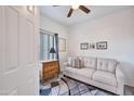 Cozy bedroom with natural light, a stylish sofa, and a modern dresser, perfect for relaxation at 3236 E Chandler Blvd # 1076, Phoenix, AZ 85048