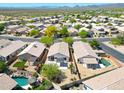 Aerial view of houses in a residential neighborhood featuring private backyards and mature landscaping at 4045 E Desert Marigold Dr, Cave Creek, AZ 85331