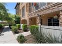 Inviting townhome showcasing stone accents, private balcony, and manicured landscaping at 4347 N 24Th Way, Phoenix, AZ 85016