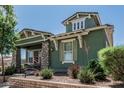 Charming two-story home with stone accents and well-maintained landscaping at 4396 N School Hill Rd, Buckeye, AZ 85396