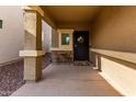 Inviting front porch featuring space for seating and a decorative front door at 4580 E Gagarinite Ln, San Tan Valley, AZ 85143