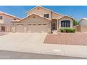 Charming two-story home with a three-car garage and well-maintained landscaping at 4746 W Taro Dr, Glendale, AZ 85308