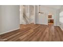 Spacious living room with wood floors and a vaulted ceiling at 4746 W Taro Dr, Glendale, AZ 85308