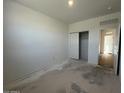 This is a spacious bedroom featuring a closet with sliding doors at 47692 W Moeller Rd, Maricopa, AZ 85139