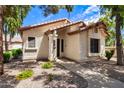 Charming single-story home featuring a neutral stucco exterior and desert landscaping at 1120 N Val Vista Dr # 110, Gilbert, AZ 85234