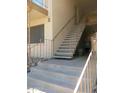 Exterior view of stairwell with unit B entrance, neutral color scheme, and metal railings at 1130 E Butler Dr # B4, Phoenix, AZ 85020