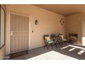 Covered front porch with outdoor seating at 13805 N Hamilton Dr # H102, Fountain Hills, AZ 85268