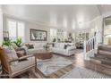Spacious living room featuring elegant furnishings and plenty of natural light, perfect for relaxation and entertainment at 1421 W Saltsage Dr, Phoenix, AZ 85045