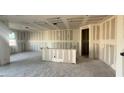 Open-concept living room with drywall, a breakfast bar, and an open layout for entertaining at 15781 W Beryl Ave, Waddell, AZ 85355