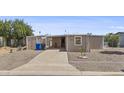 Inviting home with a tidy front yard, featuring a private driveway at 1707 S 72Nd St, Mesa, AZ 85209