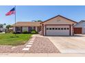 Charming single-Gathering home featuring a well-manicured lawn and an attached two-car garage at 2003 W Tyson St, Chandler, AZ 85224