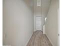 Bright entryway with wood floors and natural light flowing through at 615 E Portland St # 261, Phoenix, AZ 85004