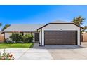 Charming single-story home featuring a well-manicured lawn and attached two car garage at 7231 W Sierra Vista Dr, Glendale, AZ 85303