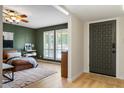 Cozy living area with ample natural light, modern decor, and a welcoming front door at 782 W Gail Dr, Chandler, AZ 85225