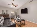 Bright living room featuring hardwood floors and comfortable seating at 901 N Quartz St, Gilbert, AZ 85234
