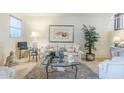Inviting living room with plush seating, neutral tones, and elegant decor for comfortable living at 9705 E Mountain View Rd # 1096, Scottsdale, AZ 85258