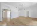Spacious living room featuring new floors and an open concept floor plan at 11775 E Becker Ln, Scottsdale, AZ 85259