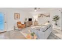 Comfortable living room featuring stylish decor, neutral color scheme, and lots of light at 1241 E Medlock Dr # 112, Phoenix, AZ 85014