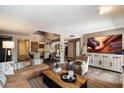 Spacious living room provides a welcoming atmosphere with hardwood floors and modern decor at 2941 E Nisbet Ct, Phoenix, AZ 85032