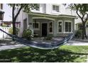 Relaxing front yard featuring a comfortable hammock, perfect for outdoor enjoyment at 3065 E Tamarisk St, Gilbert, AZ 85296