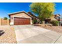 Beautiful single-story home with a 2-car garage and low-maintenance desert landscaping at 43303 N 44Th Ave, New River, AZ 85087