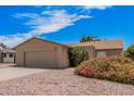 Cozy single-story home showcasing a two-car garage and mature landscaping at 5237 W Mountain View Rd, Glendale, AZ 85302