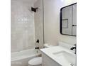 Bright bathroom featuring a shower and bath, as well as a clean vanity at 1301 N 44Th St, Phoenix, AZ 85008