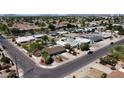 Neighborhood aerial with mature trees and close proximity to roads for easy commutes at 1644 W Roma Ave, Phoenix, AZ 85013