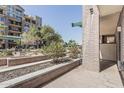Gorgeous courtyard featuring beautiful planter beds and building views at 17 W Vernon Ave # 121, Phoenix, AZ 85003