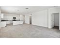 Spacious living room featuring an open floor plan with lots of natural light at 22540 N Lynn St, Maricopa, AZ 85138
