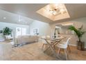 Open-concept living and dining space with vaulted ceilings and natural light at 2320 S Forest Ave, Tempe, AZ 85282