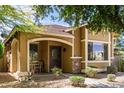 Attractive single-Gathering home with a covered porch, stone accents, and a tidy front yard at 4349 E Selena Dr, Phoenix, AZ 85050