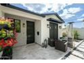 Relaxing outdoor patio space with seating, decor, and a stylish heater at 4817 N 35Th St, Phoenix, AZ 85018