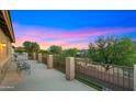 Relax on this large balcony with scenic views of the surrounding landscape and distant mountains at 5231 W Desperado Way, Phoenix, AZ 85083